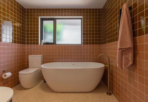 Ένα μπάνιο στο The Berry Bungalow for 6, Berry