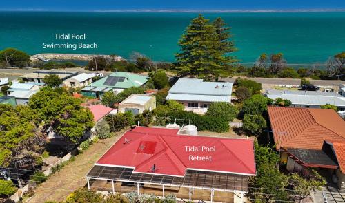 an aerial view of a small town with a red roof at Tidal Pool Retreat - Central Kingscote - 50m to beach in Kingscote