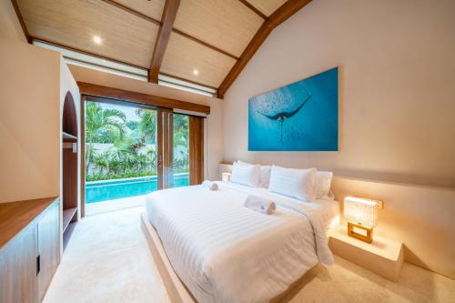 En eller flere senge i et værelse på Salt House