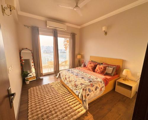 En eller flere senge i et værelse på Valley of us