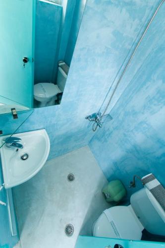 Ванная комната в Kissamia Rooms - Next to Night Clubs