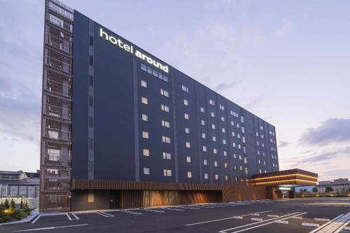 a hotel with a sign on the side of a building at hotel around TAKAYAMA, an Ascend Collection Hotel in Takayama