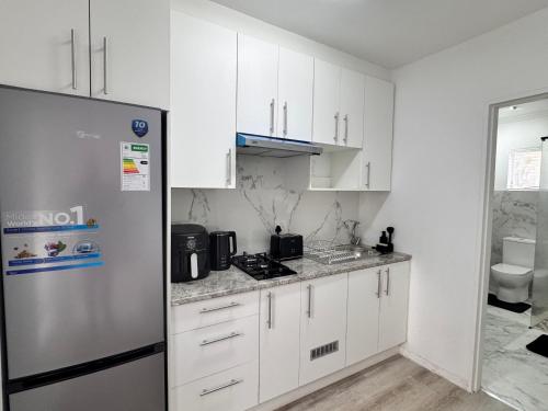 Kuchyň nebo kuchyňský kout v ubytování 55 Albatross Guesthouse