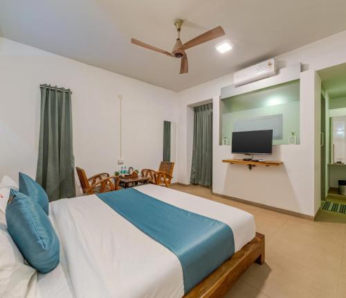 TV a/nebo společenská místnost v ubytování Hotel Zorba Inn