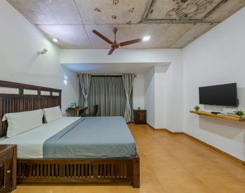 Postel nebo postele na pokoji v ubytování Hotel Zorba Inn