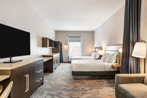 Postel nebo postele na pokoji v ubytování Home2 Suites Pensacola I-10 At North Davis Hwy