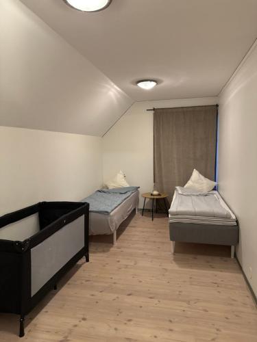 Ένα ή περισσότερα κρεβάτια σε δωμάτιο στο Lunden