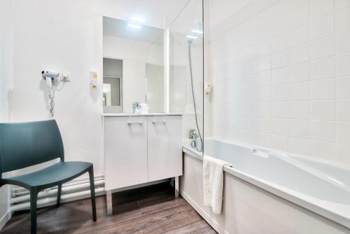 Ένα μπάνιο στο Comfort Aparthotel Toulouse Métropole