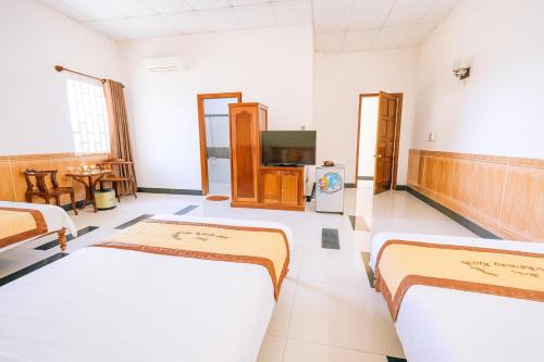 Μια τηλεόραση ή/και κέντρο ψυχαγωγίας στο Trúc Hoàng Hà Hotel