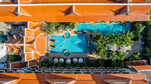 an aerial view of a resort with a swimming pool at Nipa Resort, Patong Beach in Patong Beach
