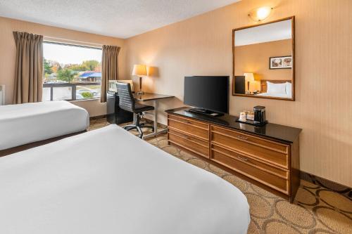 Ένα ή περισσότερα κρεβάτια σε δωμάτιο στο Comfort Inn