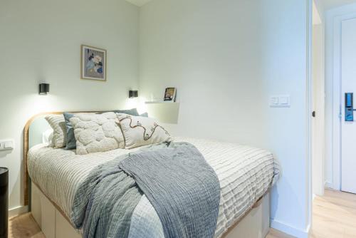 Postel nebo postele na pokoji v ubytování Be Casa Barakaldo