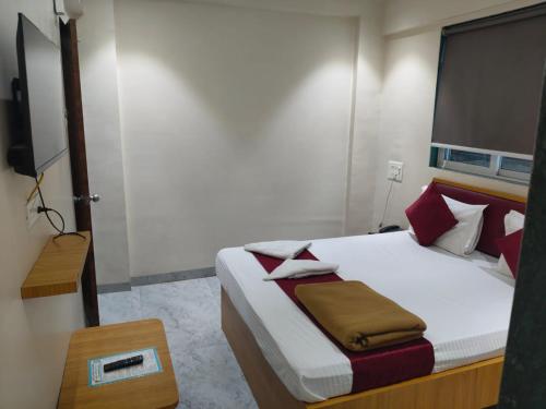 Ένα ή περισσότερα κρεβάτια σε δωμάτιο στο Palm lodging and boarding