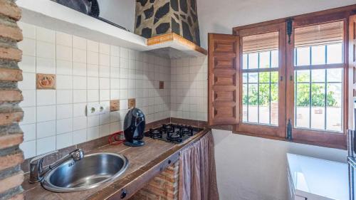 Køkken eller tekøkken på Casa El Cerro El Borge by Ruralidays