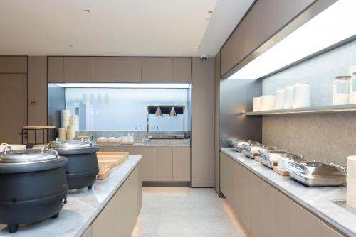 Køkken eller tekøkken på JI Hotel Shanghai Jiaotong University Jinping Road