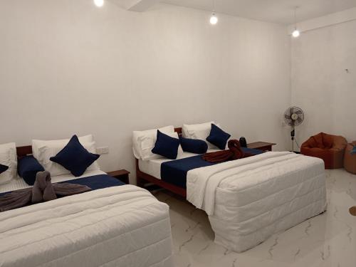 Postel nebo postele na pokoji v ubytování Camellia Inn