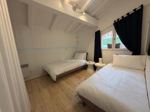 Postel nebo postele na pokoji v ubytování Chalet Pierra Menta