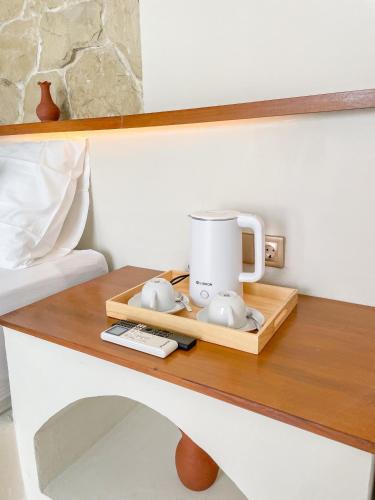 Tiện nghi pha trà/cà phê tại Staycationku Premium Jogja Villas