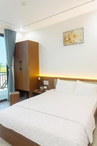 Postel nebo postele na pokoji v ubytování Visip 2 Hotel