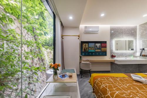 TV/trung tâm giải trí tại 尚品原宿海景 厦门大学双子塔店