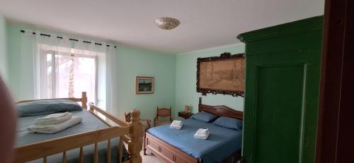 Ένα ή περισσότερα κρεβάτια σε δωμάτιο στο La cuccia del sole