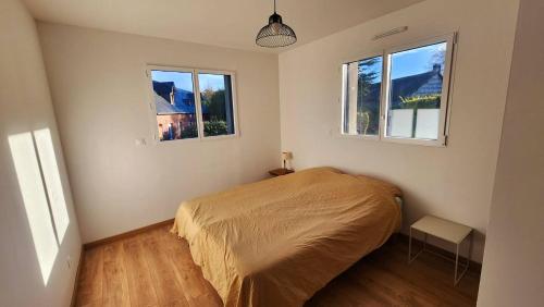 Giường trong phòng chung tại La campagne aux portes de la Mer - Maison avec jardin privé - proche Veules-les-Roses