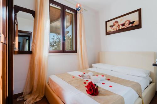 Postel nebo postele na pokoji v ubytování Villa Dolce Vita by Vivimy