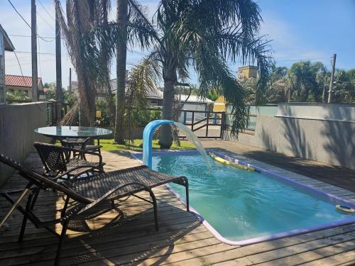 Swimmingpoolen hos eller tæt på Piscina com Hidro Perto da Praia Poucas datas disponíveis