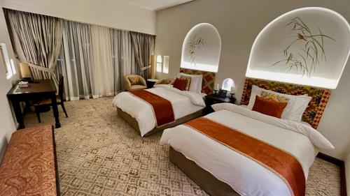 Postel nebo postele na pokoji v ubytování Sost Serena Hotel