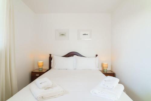 En eller flere senge i et værelse på GuestReady - Hillside Escape I