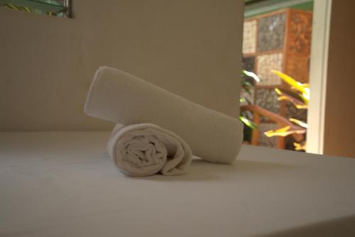 a toy train sitting on a shelf in a room at Stefanie Grace Inn in Loboc