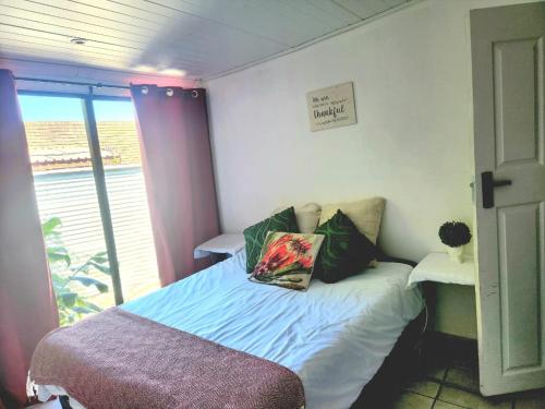 Postel nebo postele na pokoji v ubytování CLR Accommodation