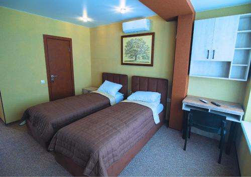 Postel nebo postele na pokoji v ubytování Український тенісний центр Viccourt