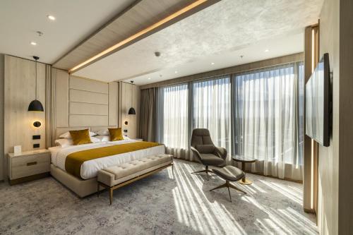 Postel nebo postele na pokoji v ubytování East Plaza Hotel