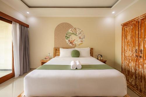 Giường trong phòng chung tại Cove Cubang Homestay