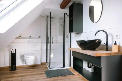 Koupelna v ubytování City Apartment