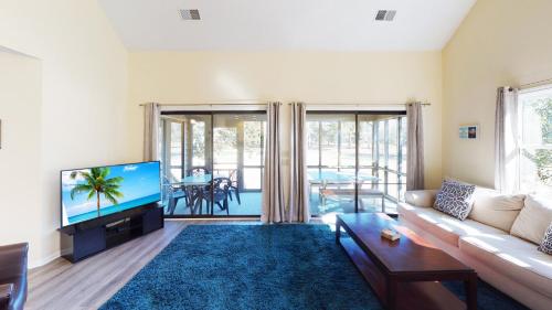 Et tv og/eller underholdning på Club Villas Unit 4A