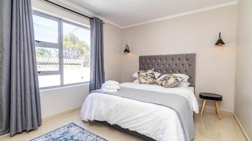 En eller flere senge i et værelse på Oceanberg apartments