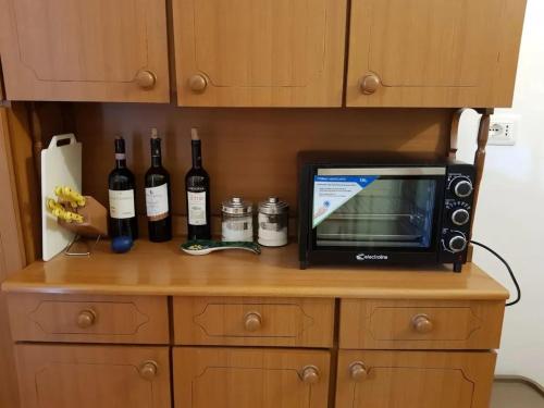 Η κουζίνα ή μικρή κουζίνα στο Charming Chalet with Terrace in Lavinaio – 32 m²