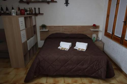 Ένα ή περισσότερα κρεβάτια σε δωμάτιο στο Charming Chalet with Terrace in Lavinaio – 32 m²