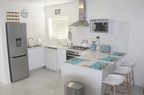 Køkken eller tekøkken på Mont Serrat, West Beach, Whispering Waves