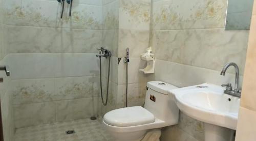 Koupelna v ubytování Sakura Hotel