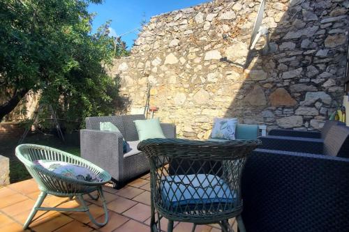 Posezení v ubytování L'amandier - Maison avec jardin sans vis à vis