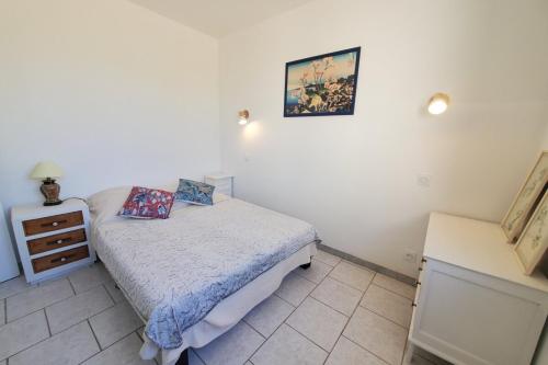 Postel nebo postele na pokoji v ubytování L'amandier - Maison avec jardin sans vis à vis