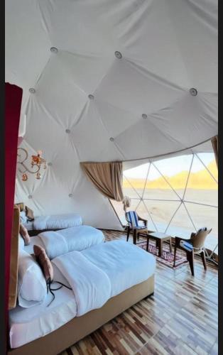 Ένα ή περισσότερα κρεβάτια σε δωμάτιο στο Haven Luxury Camp