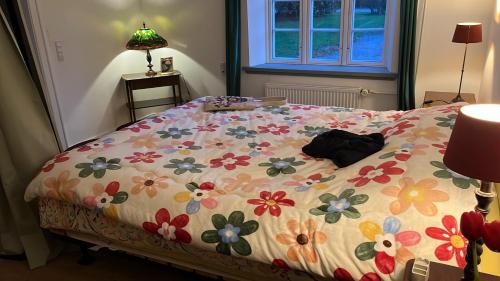 Ένα ή περισσότερα κρεβάτια σε δωμάτιο στο BeBaBopS Homestay Sønderborg