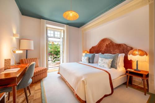 Ένα ή περισσότερα κρεβάτια σε δωμάτιο στο Pergola Boutique Hotel