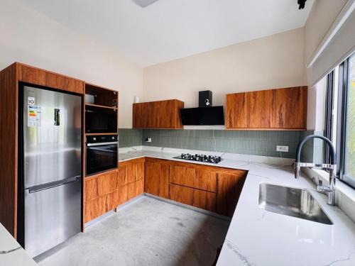 Kuchyň nebo kuchyňský kout v ubytování City Contemporary Comfort