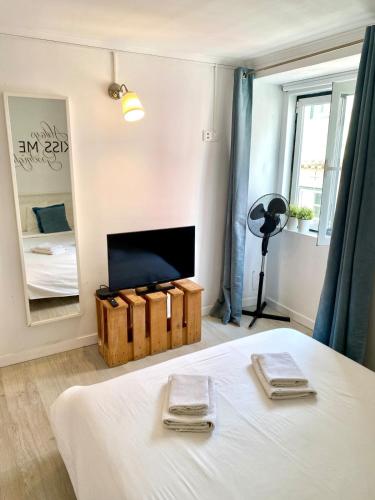 En eller flere senge i et værelse på Tejo River View Classic Flat in Lisbons Historic Heart