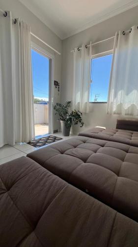 Postel nebo postele na pokoji v ubytování Casa em Penha